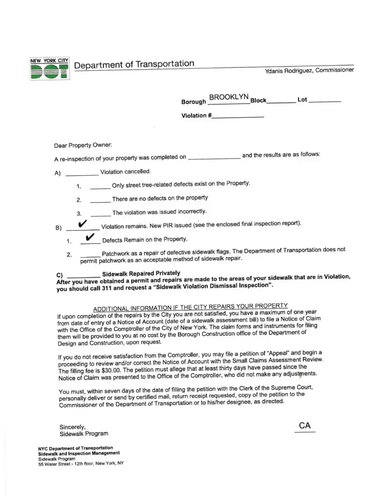 NYC Department of Transportation letter confirming a sidewalk violation was removed